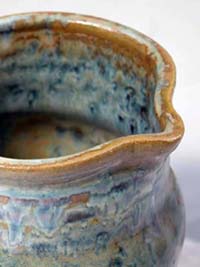 Light Blue pitcher with rust highlights